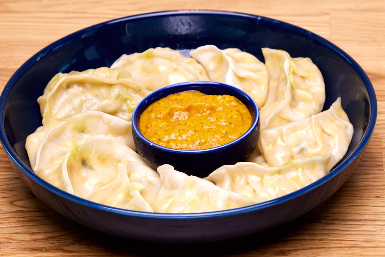 Momos with a dipping sauce